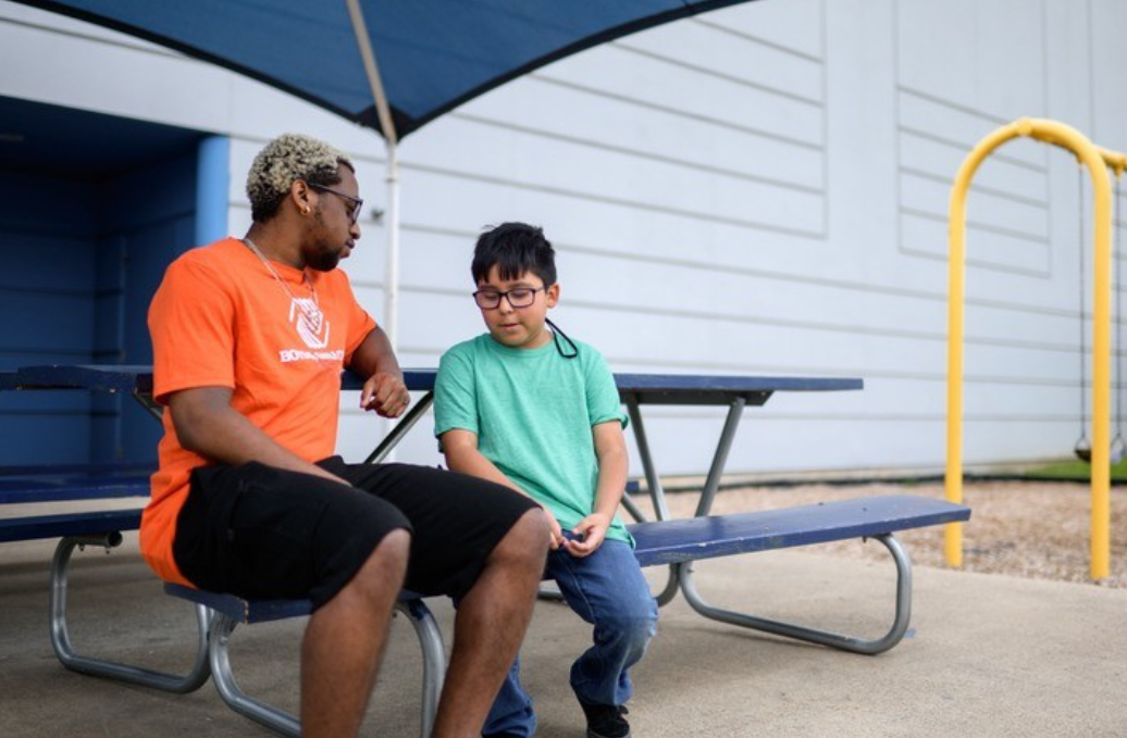 Kid w Adult Helping